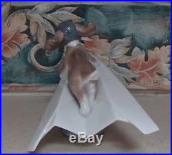 Lladro #6665 Let's Fly Away puppy dog in a paper airplane MINT, no box, RV$210
