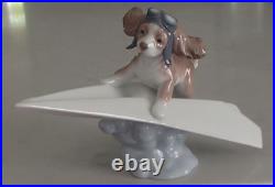 Lladro 6665 Let's Fly Away puppy dog on paper airplane goggles MWOB, RV$260