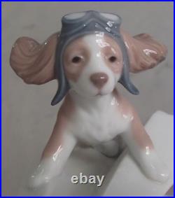 Lladro 6665 Let's Fly Away puppy dog on paper airplane goggles MWOB, RV$260