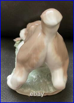 Lladro 6832, @A Sweet Smell, Dog with Flower