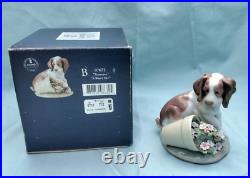 Lladro 7672 It Wasn't Me Dog and Flower figurine Collectors Series with Box