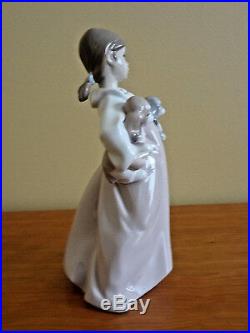 Lladro Arms Full of Love Girl withTwo Dogs Figurine # 6419