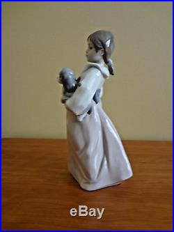 Lladro Arms Full of Love Girl withTwo Dogs Figurine # 6419