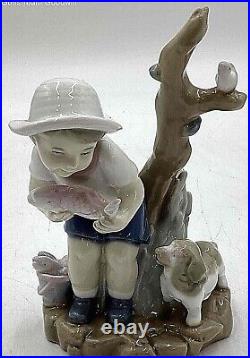 Lladro Boy Catching Fish In Hand With A Dog And Abird