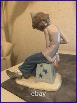 Lladro Boy/Clown with Saxophone and Dog