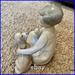 Lladro Boy With Dog Figurine