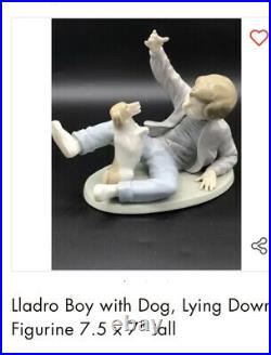 Lladro Boy playing with dog