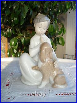 Lladro-Boy with Dog. # 4522. Excellent Pre-Owned Condition.no box