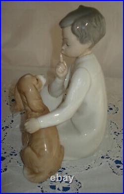 Lladro-Boy with Dog. # 4522. Excellent Pre-Owned Condition.no box