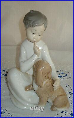 Lladro-Boy with Dog. # 4522. Excellent Pre-Owned Condition.no box