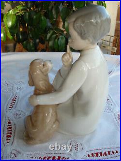 Lladro-Boy with Dog. # 4522. Excellent Pre-Owned Condition.no box
