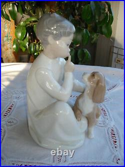 Lladro-Boy with Dog. # 4522. Excellent Pre-Owned Condition.no box