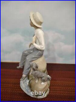 Lladro Boy with Dog Figurine