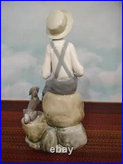 Lladro Boy with Dog Figurine