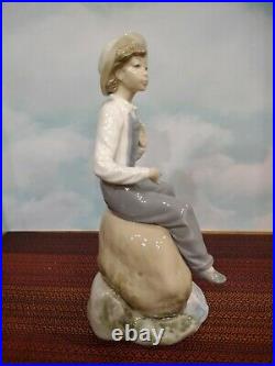 Lladro Boy with Dog Figurine