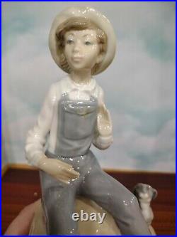 Lladro Boy with Dog Figurine