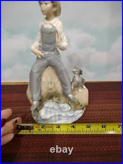 Lladro Boy with Dog Figurine