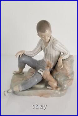 Lladro Boy with Dog Porcelain Figurine L 10