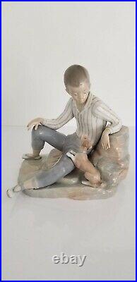 Lladro Boy with Dog Porcelain Figurine L 10