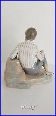 Lladro Boy with Dog Porcelain Figurine L 10