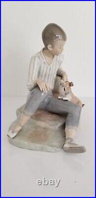 Lladro Boy with Dog Porcelain Figurine L 10