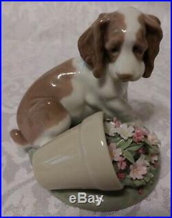 Lladro Collectors Series # 7672 Travesura. It Wasn't Me Dog With Flower Pot