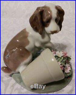 Lladro Collectors Series # 7672 Travesura. It Wasn't Me Dog With Flower Pot