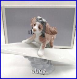 Lladro Dog on a Paper Plane Puppy Porcelain Figurine 010.06665