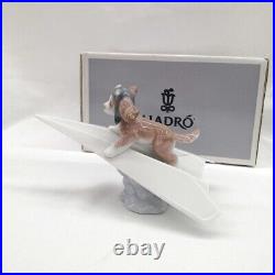 Lladro Dog on a Paper Plane Puppy Porcelain Figurine 010.06665
