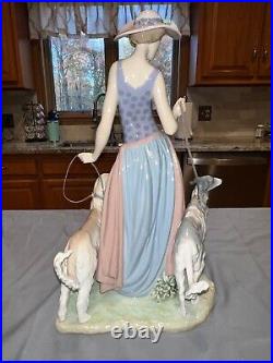 Lladro Elegant Promenade Woman with Dogs Figurine 5802