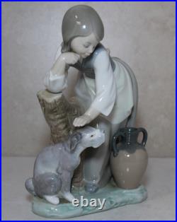 Lladro Figurine, 1246 Caress and Rest, Girl caressing her dog (ln box)