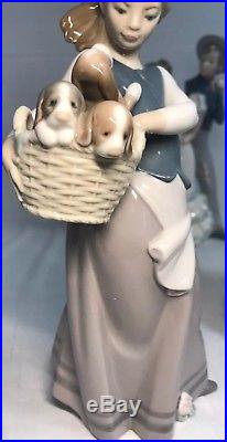 Lladro Figurine #1311 Little Dogs On Hip Girl With a Basket Full Of Puppies