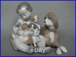 Lladro Figurine 5456 New Playmates Young Boy With Dog & Puppies