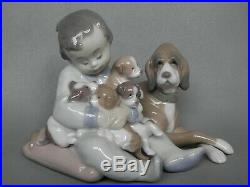 Lladro Figurine 5456 New Playmates Young Boy With Dog & Puppies