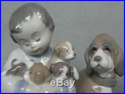 Lladro Figurine 5456 New Playmates Young Boy With Dog & Puppies