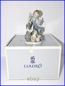 Lladro Figurine #5736 Puppet Show Boy with Dog & Cats with box Excellent Condition