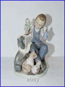 Lladro Figurine #5736 Puppet Show Boy with Dog & Cats with box Excellent Condition