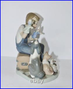 Lladro Figurine #5736 Puppet Show Boy with Dog & Cats with box Excellent Condition