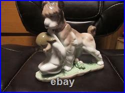 Lladro Figurine, 6556 Gorgeous Safe and Sound, boy & dog, Society piece