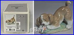 Lladro Figurine, 6832 A Sweet Smell, Dog with Flower, 4.25H $250 V