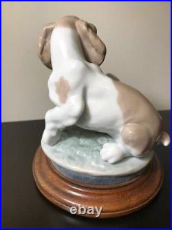 Lladro Figurine #7672 It Wasn't Me! Dog with Flower Pot, with base 1998 Retired