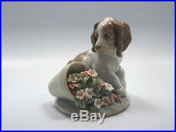Lladro Figurine #7672 It Wasn't Me, Puppy Dog with Flowers, with box
