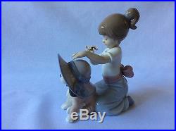 Lladro Figurine AN ELEGANT TOUCH GIRL WITH DOG HAT FLOWERS #6862 Mint