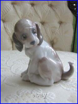 Lladro Gentle Surprise Dog with Butterfly #6210