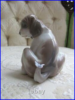 Lladro Gentle Surprise Dog with Butterfly #6210