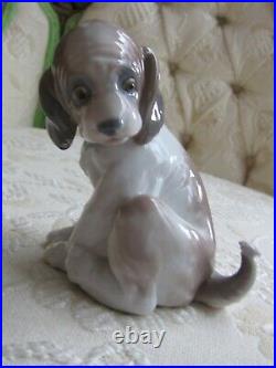 Lladro Gentle Surprise Dog with Butterfly #6210