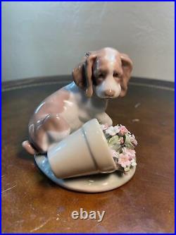 Lladro It Wasnt Me dog and flowers