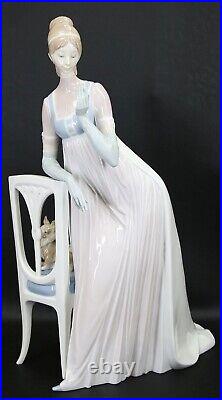 Lladro Lady Empire Porcelain Figurine with tall chair and dog, 19 inches
