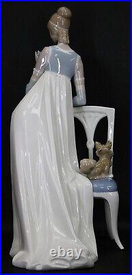 Lladro Lady Empire Porcelain Figurine with tall chair and dog, 19 inches