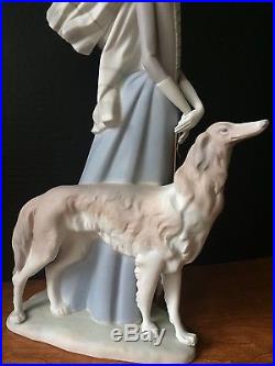 Lladro Lady Walking Dog Figurine